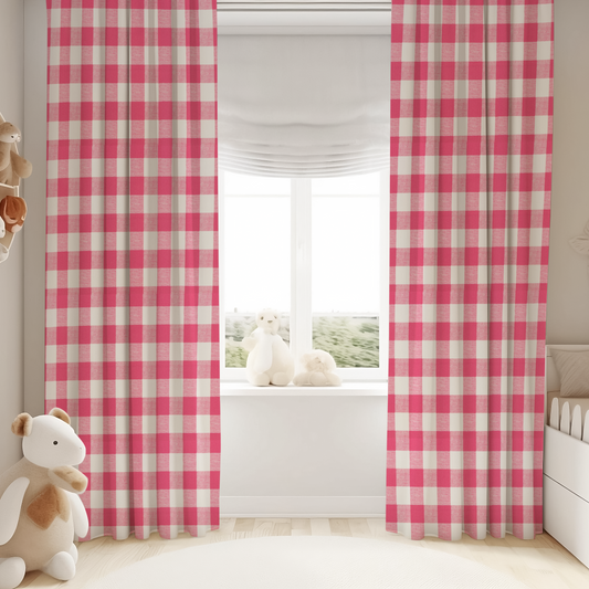 Pink and white checkered curtains in a child's room with toys and a window.